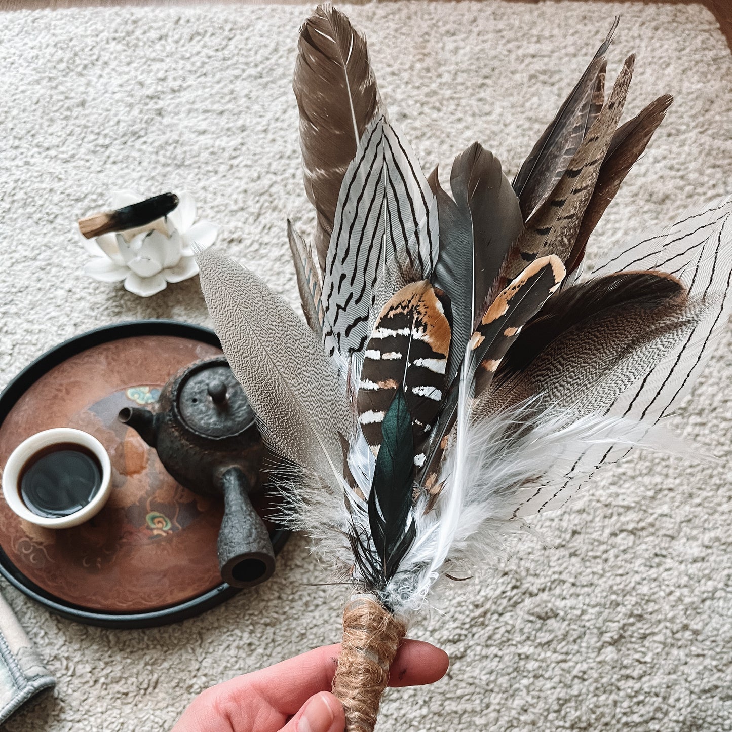 Handcrafted shamanic feather fan with selenite, designed for smudging ceremonies, energy cleansing, and spiritual rituals