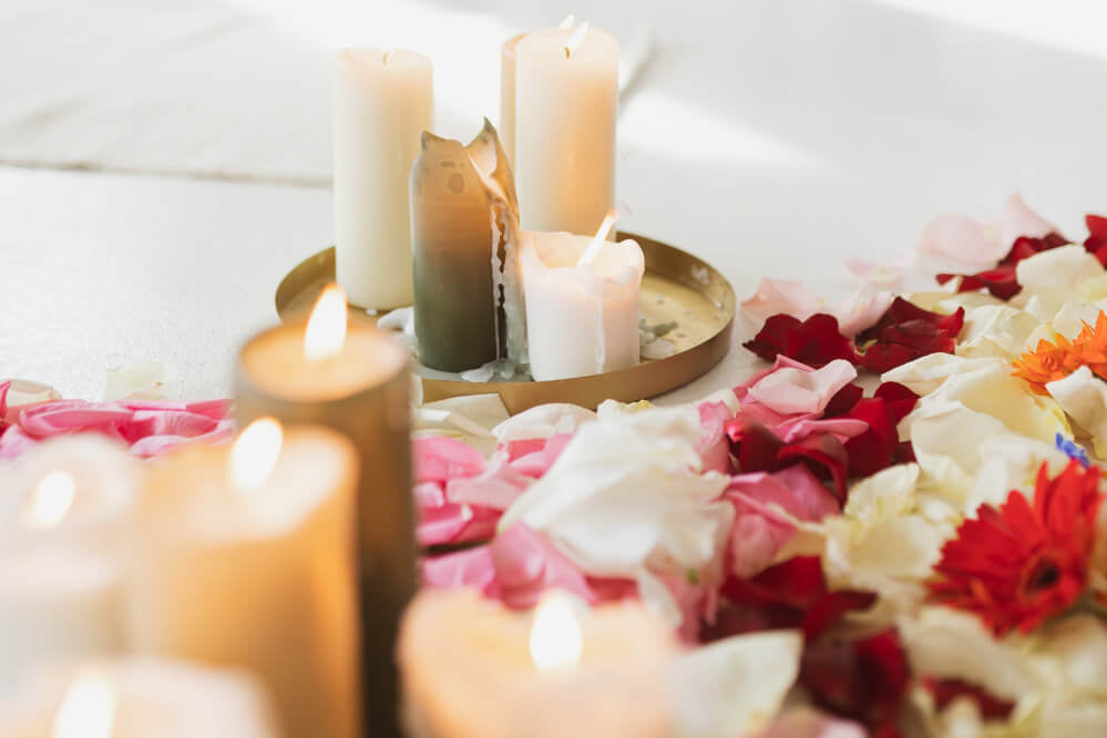 Candles and flowers on a ceremony altar